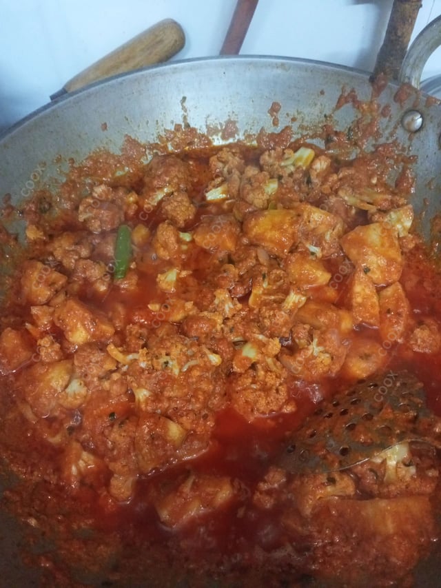 Tasty Aloo Patta Gobhi cooked by COOX chefs cooks during occasions parties events at home