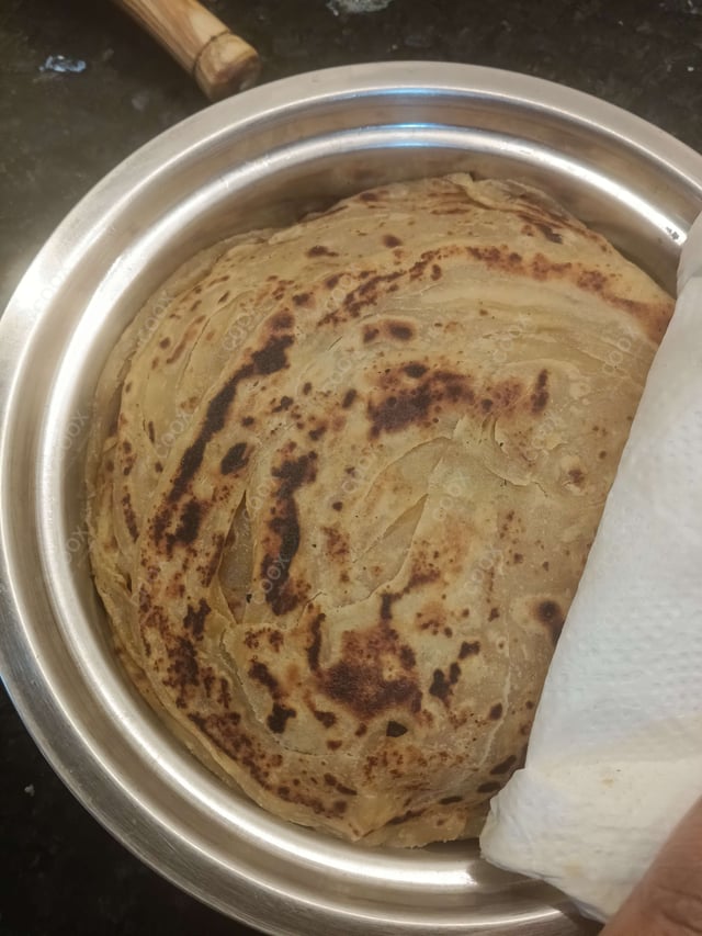 Delicious Naan (Butter / Garlic) prepared by COOX