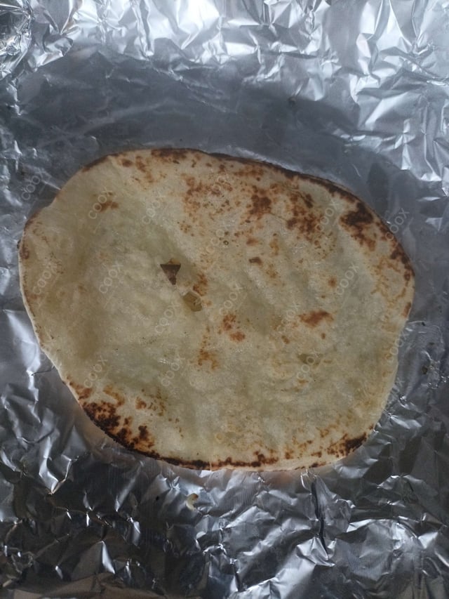 Delicious Naan (Butter / Garlic) prepared by COOX