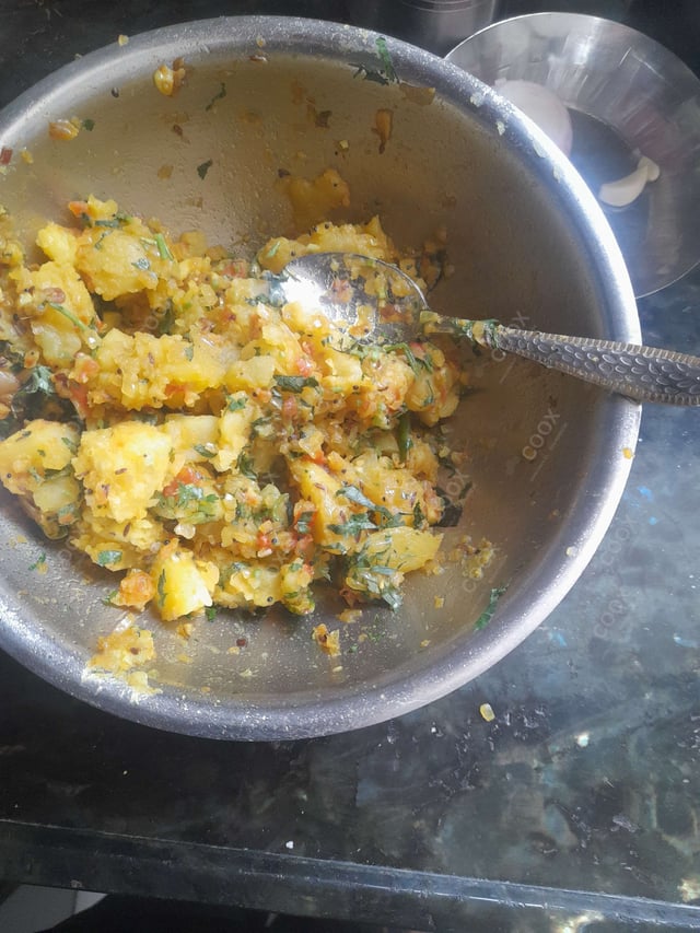 Delicious Jeera Aloo prepared by COOX