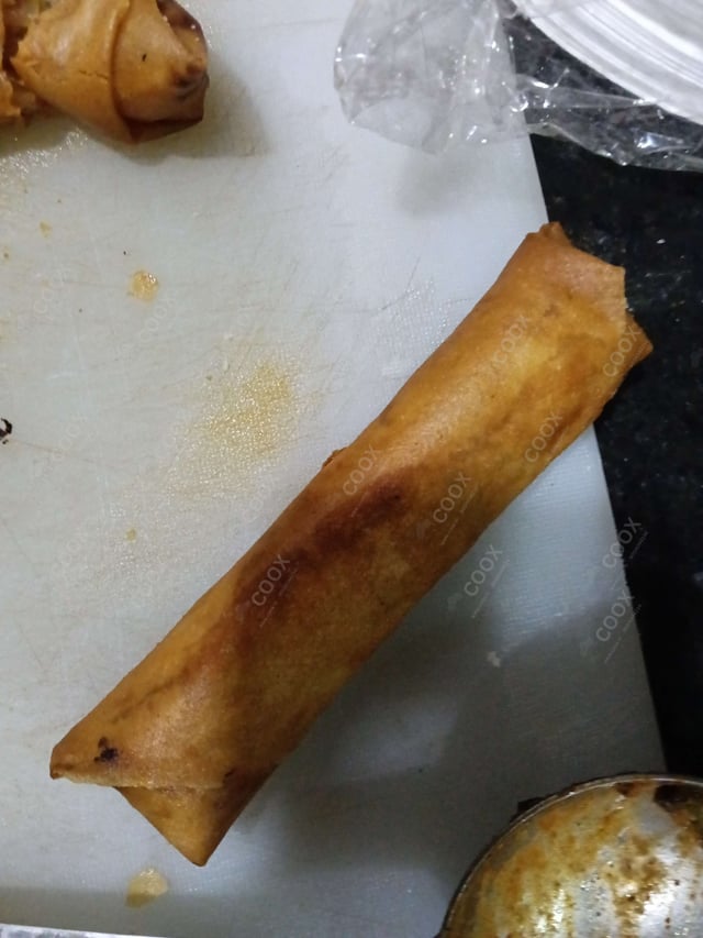 Delicious Veg Spring Rolls prepared by COOX