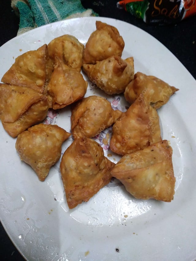 Delicious Mini Samosas prepared by COOX