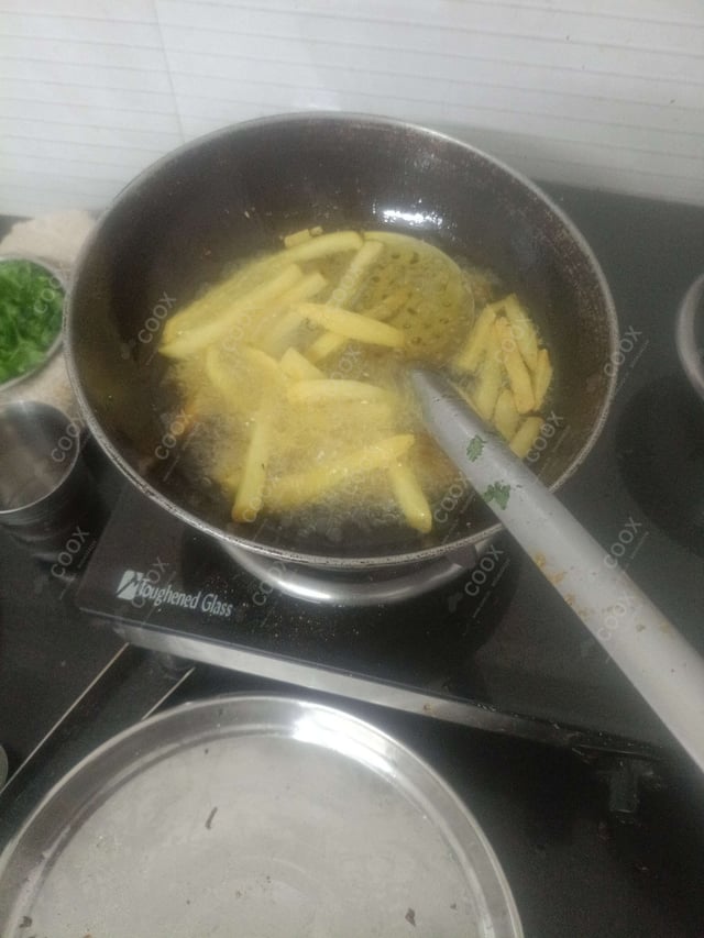 Delicious French Fries prepared by COOX