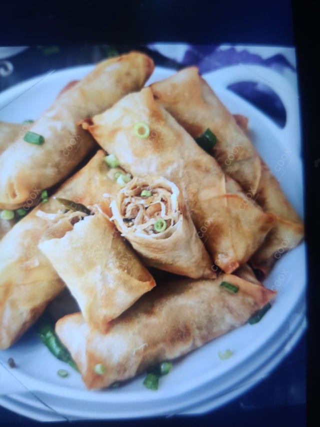 Delicious Veg Spring Rolls prepared by COOX