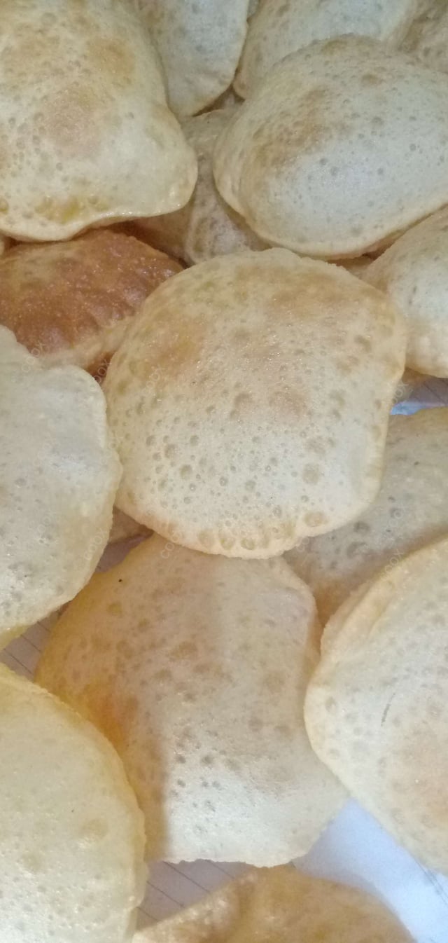 Tasty Pooris & Bedmis cooked by COOX chefs cooks during occasions parties events at home