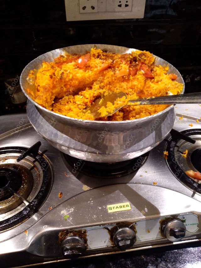 Delicious Jeera Rice prepared by COOX