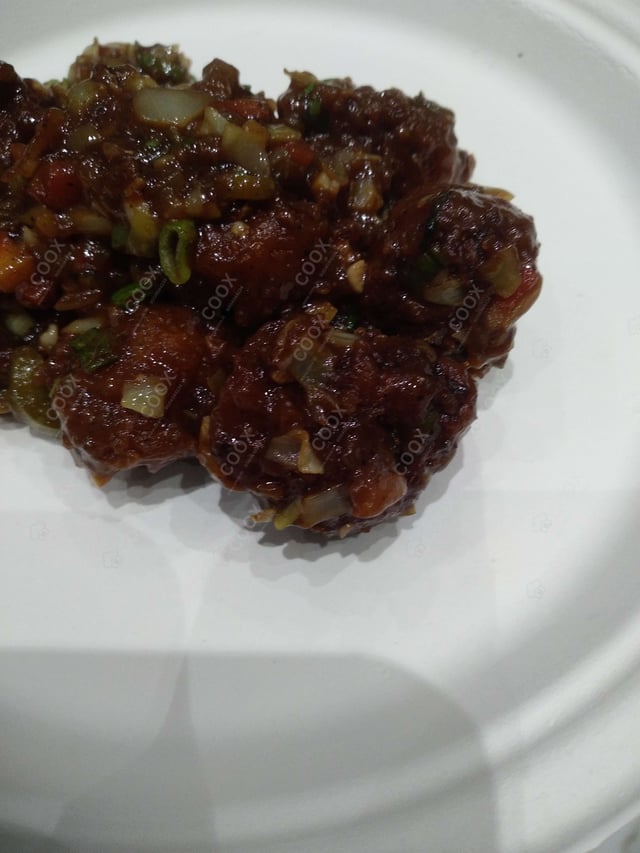 Delicious Veg Manchurian (Dry) prepared by COOX