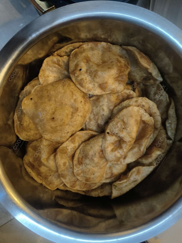 Delicious Pooris & Bedmis prepared by COOX