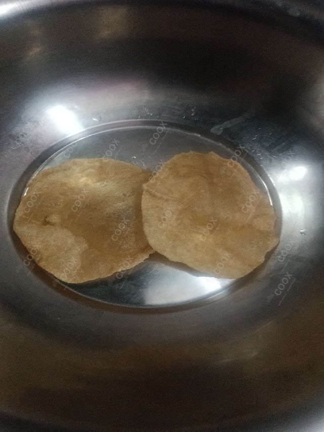 Delicious Pooris & Bedmis prepared by COOX