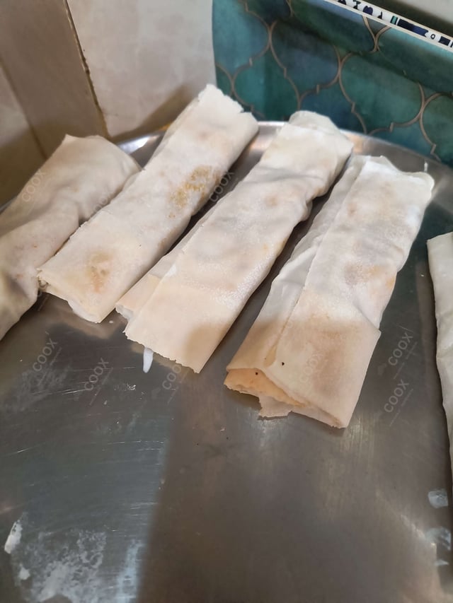 Delicious Veg Spring Rolls prepared by COOX