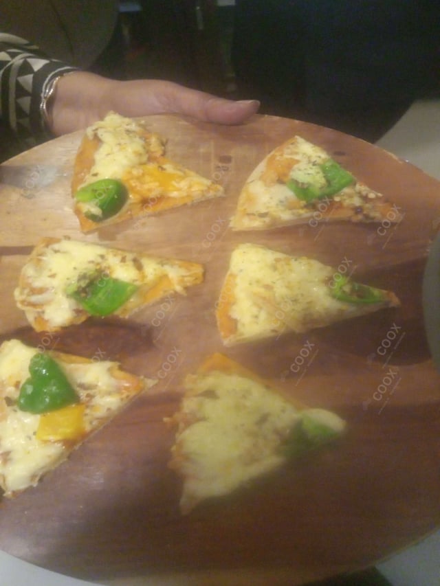 Delicious Margherita Pizza prepared by COOX