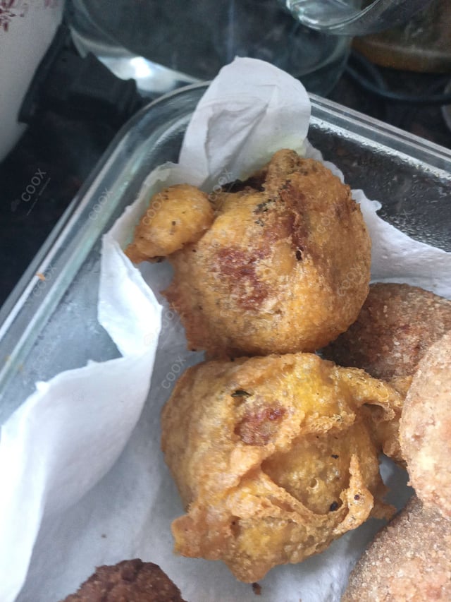 Tasty Aloo Bonda cooked by COOX chefs cooks during occasions parties events at home