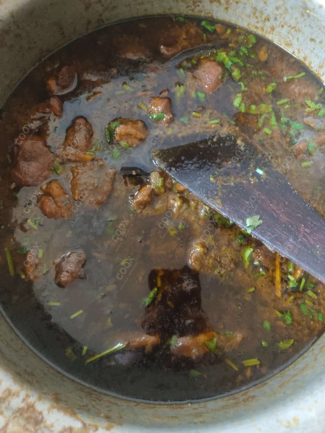 Tasty Saag Gosht cooked by COOX chefs cooks during occasions parties events at home