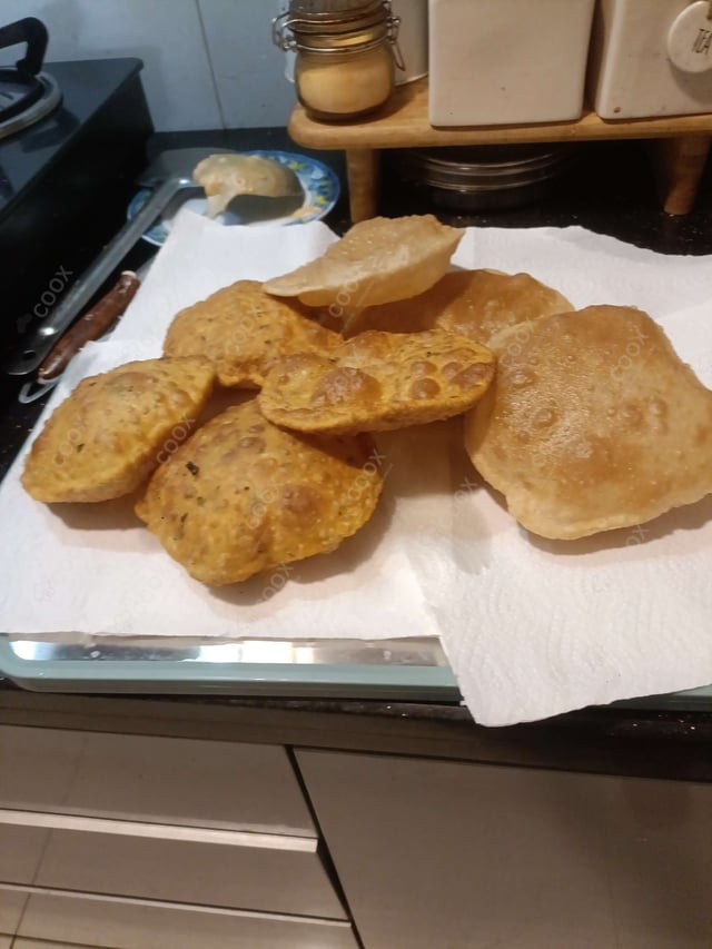 Delicious Pooris & Bedmis prepared by COOX