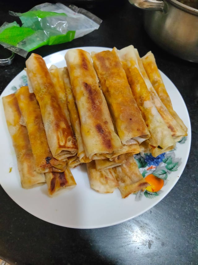 Delicious Veg Spring Rolls prepared by COOX