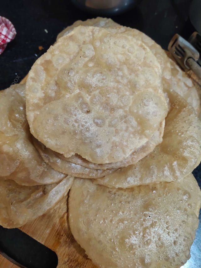 Delicious Pooris & Bedmis prepared by COOX