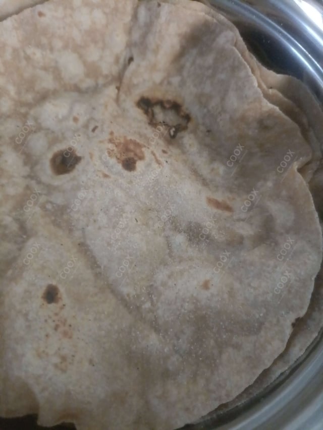 Delicious Chana Bhatura prepared by COOX