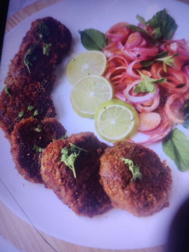 Delicious Dahi ke Sholey prepared by COOX