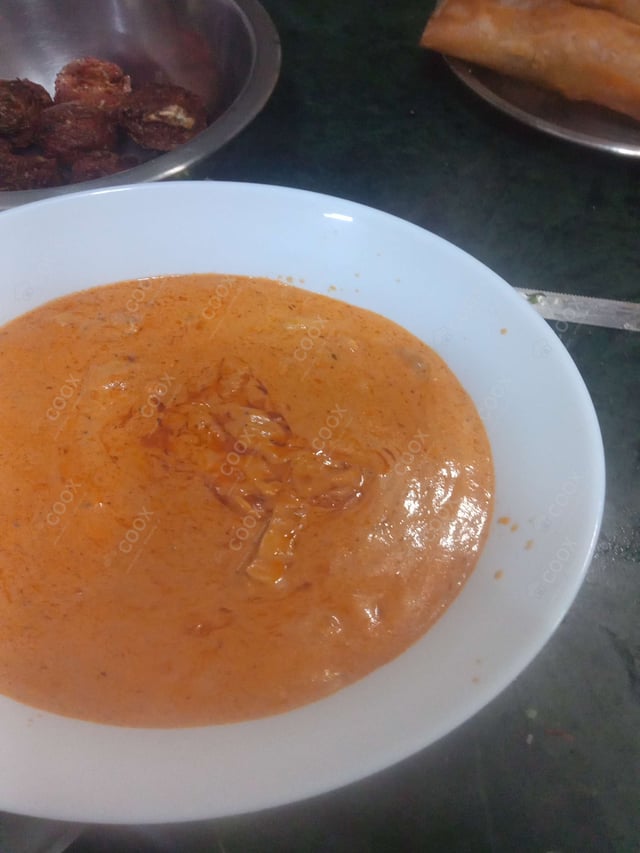 Delicious Ravioli in Pink Sauce prepared by COOX