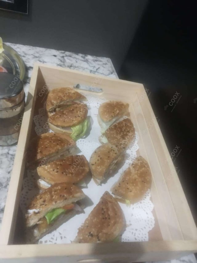 Tasty Mini Veg Burgers cooked by COOX chefs cooks during occasions parties events at home