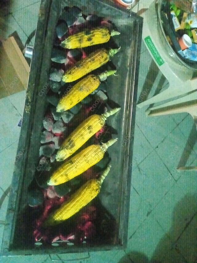 Tasty Grilled Corn cooked by COOX chefs cooks during occasions parties events at home