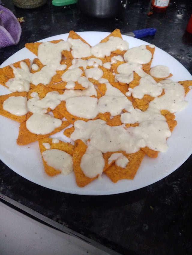 Delicious Cheese Nachos prepared by COOX