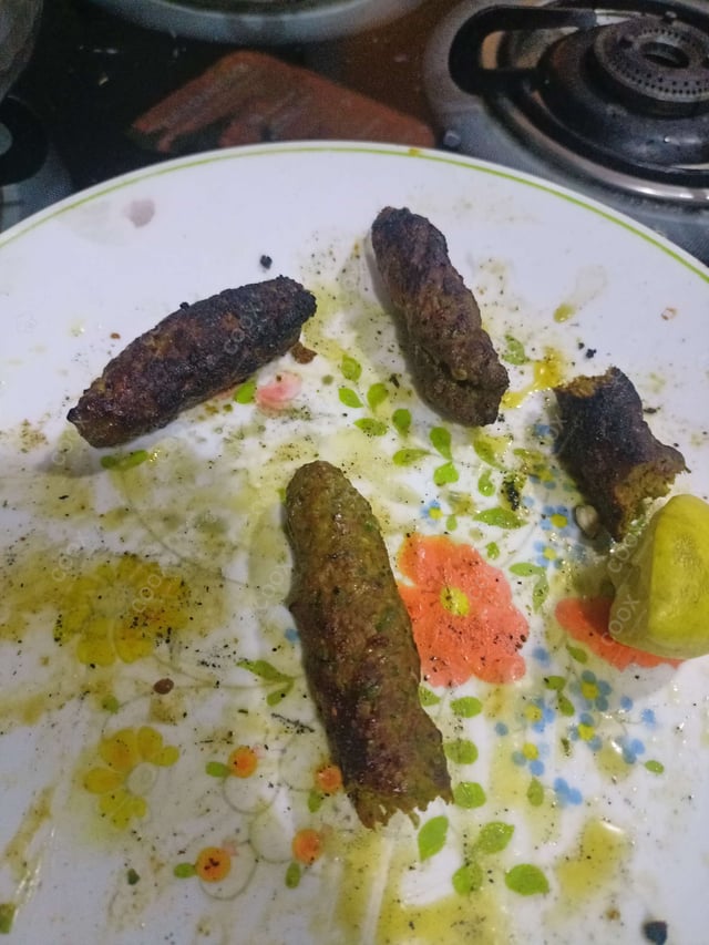 Delicious Mutton Seekh Kebab prepared by COOX