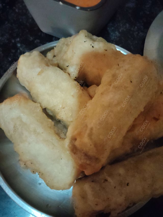 Delicious Chicken Spring Rolls prepared by COOX