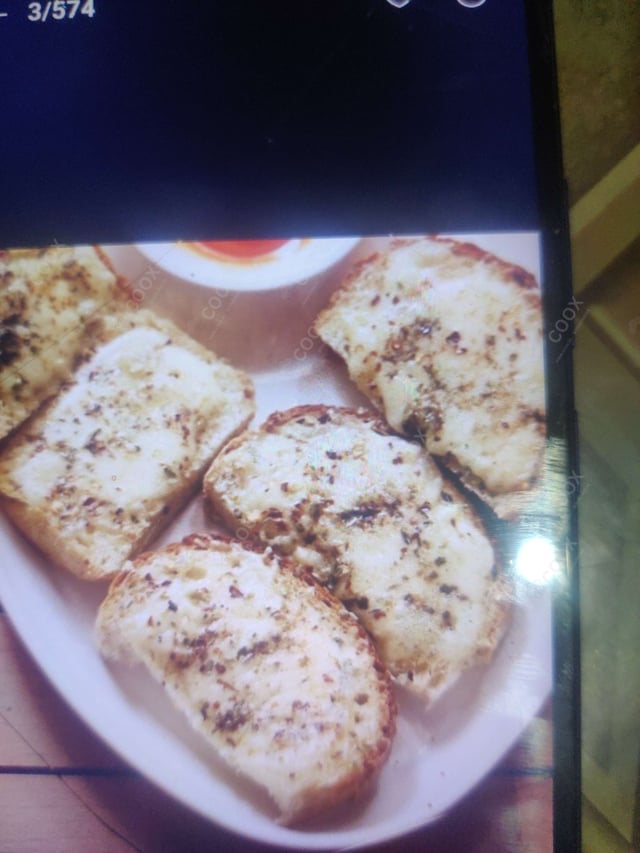 Delicious Garlic Bread with Cheese prepared by COOX