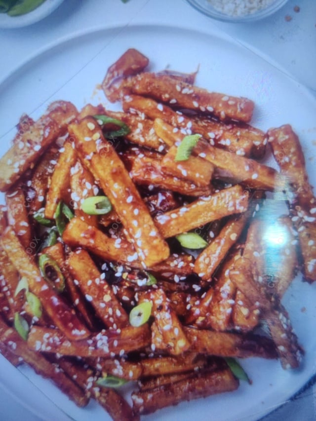 Delicious Honey Chilli Potato prepared by COOX