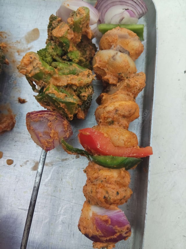 Delicious Mushroom Tikka prepared by COOX