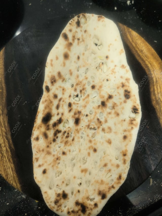 Delicious Naan (Butter / Garlic) prepared by COOX