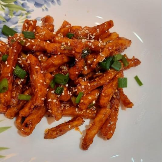 Tasty Honey Chilli Potato cooked by COOX chefs cooks during occasions parties events at home