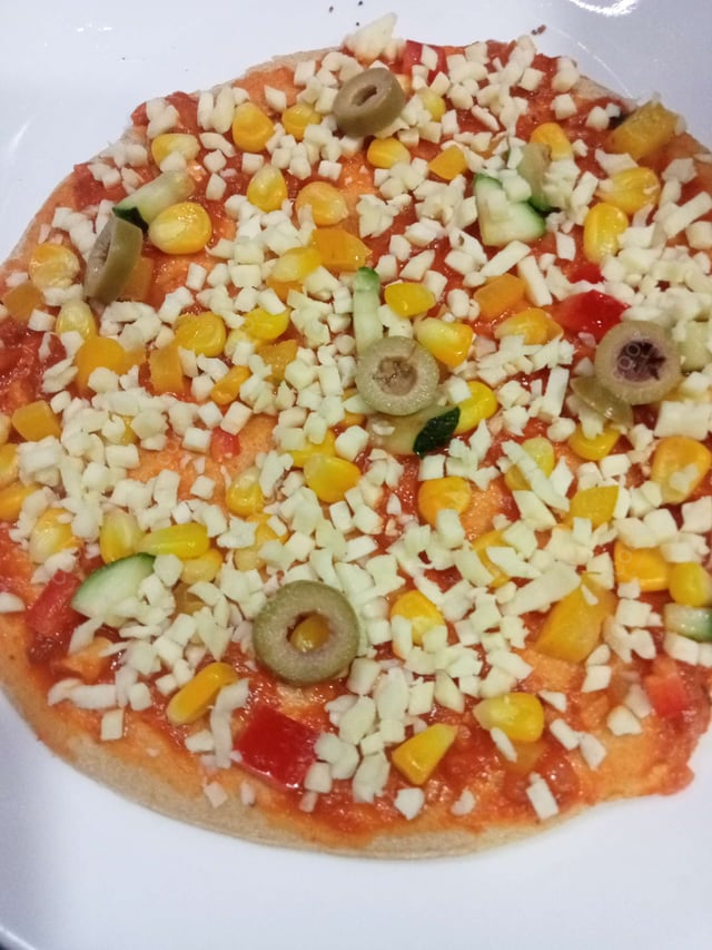 Delicious Veg Pizza prepared by COOX