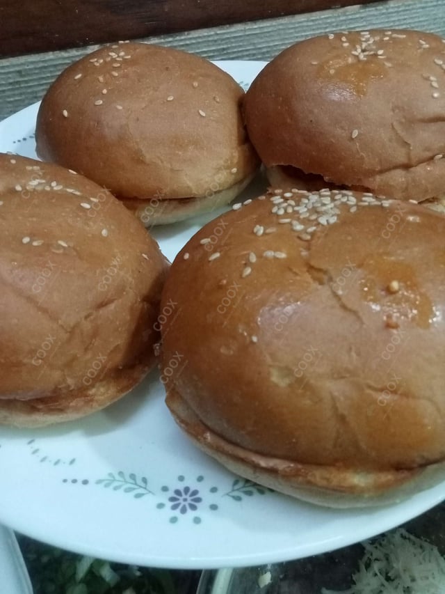 Delicious Paneer Tikka Burger prepared by COOX