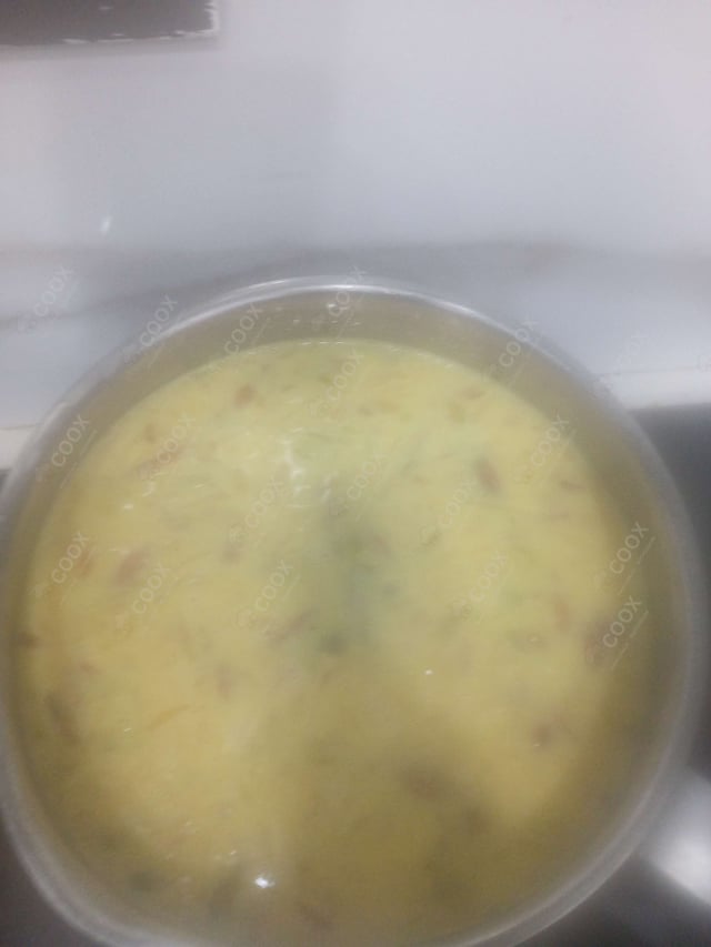 Tasty Hot Kadhai Milk cooked by COOX chefs cooks during occasions parties events at home