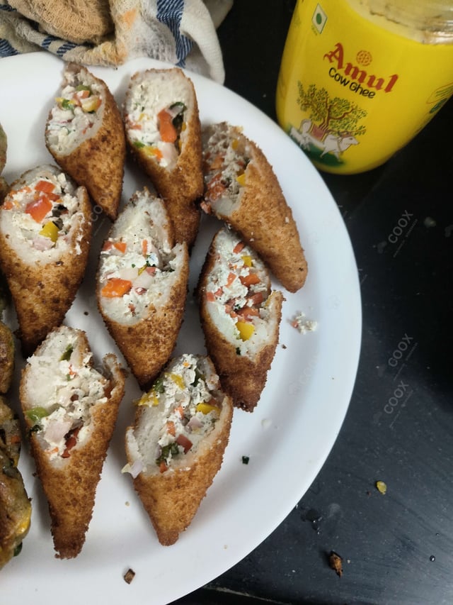 Delicious Dahi ke Sholey prepared by COOX