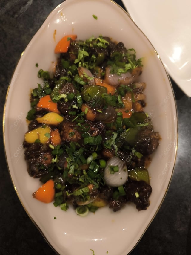 Delicious Chilli Chicken prepared by COOX