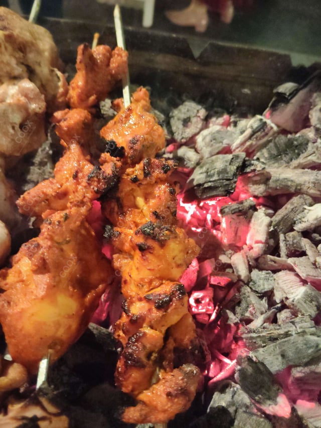 Delicious Chicken Seekh Kebab prepared by COOX