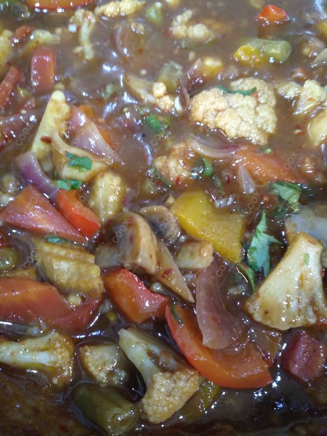 Delicious Mix Veg in Hot Garlic Sauce prepared by COOX