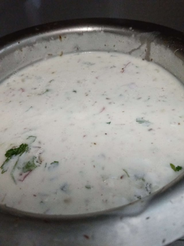 Tasty Onion Raita cooked by COOX chefs cooks during occasions parties events at home