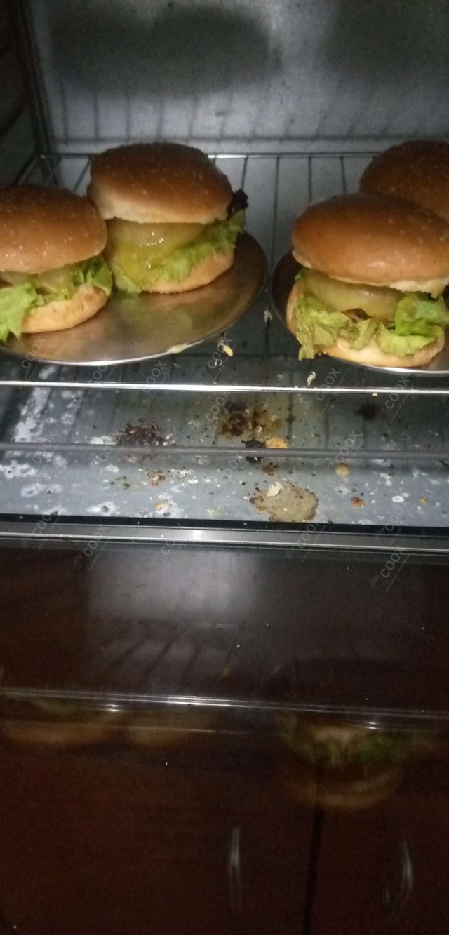 Tasty Mini Veg Burgers cooked by COOX chefs cooks during occasions parties events at home