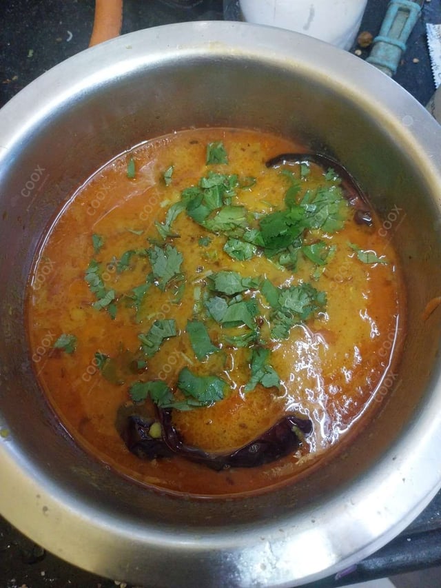 Delicious Dal Tadka prepared by COOX