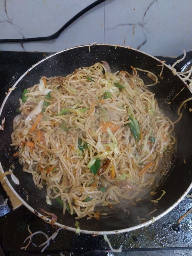 Delicious Veg Hakka Noodles prepared by COOX