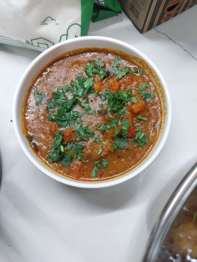 Tasty Tomato Curry cooked by COOX chefs cooks during occasions parties events at home