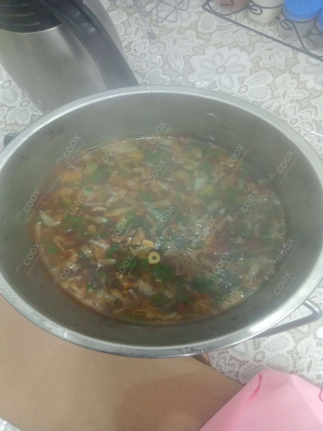 Delicious Vegetable Manchow Soup prepared by COOX