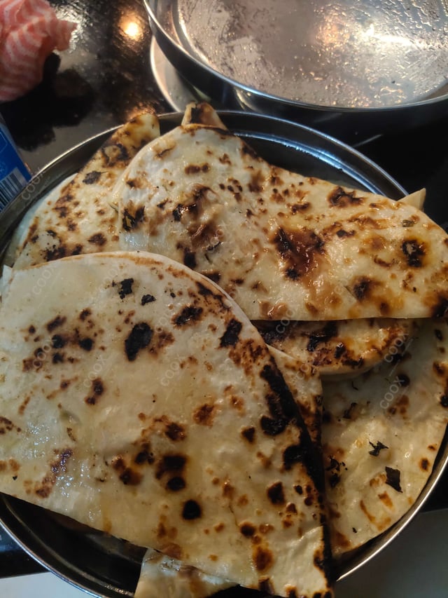 Delicious Naan (Butter / Garlic) prepared by COOX