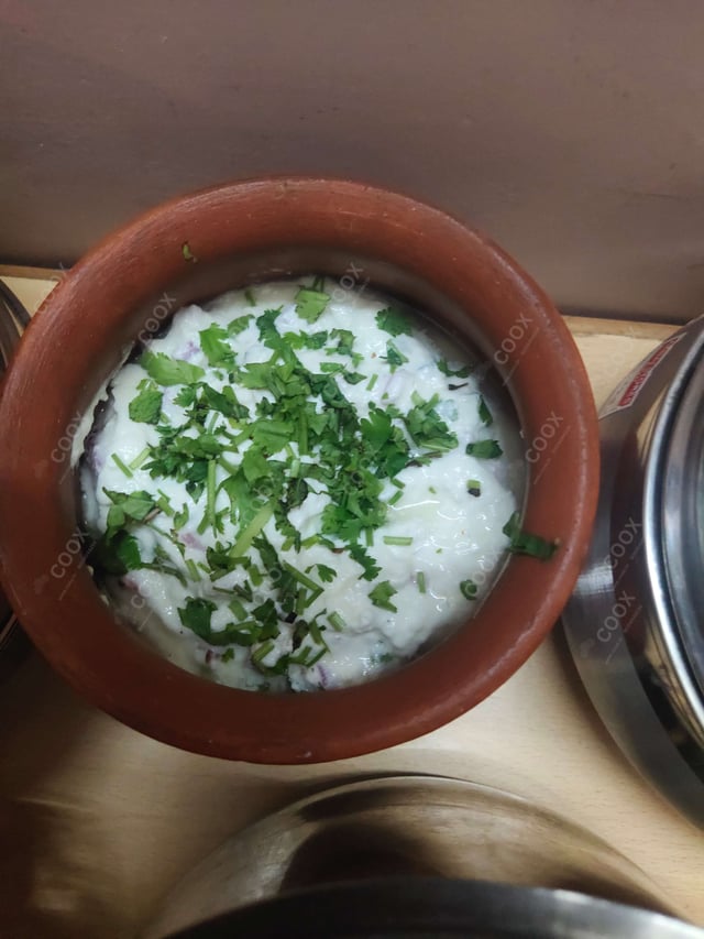 Delicious Mix Veg Raita prepared by COOX