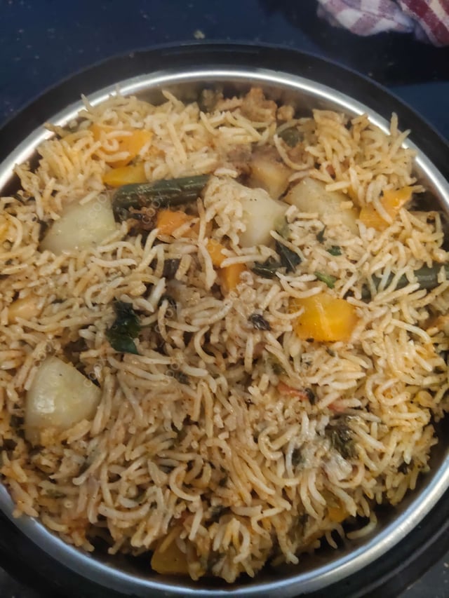 Delicious Veg Biryani prepared by COOX