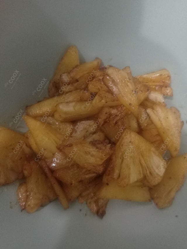 Tasty Pan Fried Pineapple cooked by COOX chefs cooks during occasions parties events at home